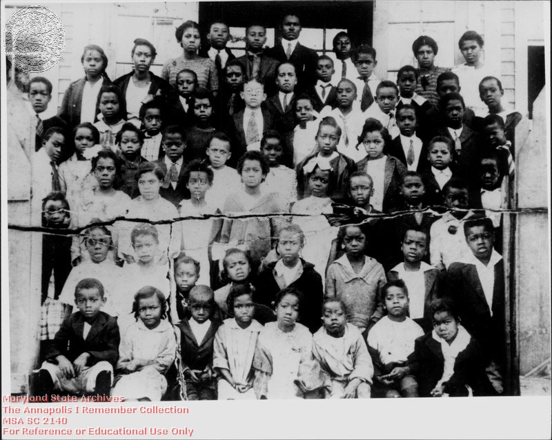 1923 c. Unknown Eastport Elementary School, Chester Avenue and Third Street, Grades 1-7. Mr. Holt, Principal, in back row. Building is now Seafarer's Yacht Club.