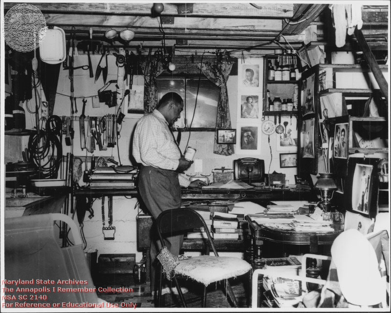 1953 c. Baden, Thomas Jr. Thomas Baden's darkroom and work room